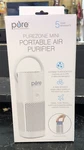 Enrichment Portable Air Purifier Purezone Mini Three Fan Speeds. Fixed Price $21.99.