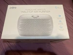 Enrichment Purezone Breeze Tabletop Air Purifier, White. Fixed Price $24.99.