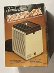 Vintage Sunbeam Fresh'nd-aire Cleaner Woodgrain 57-16 New Box. Fixed Price $42.99.